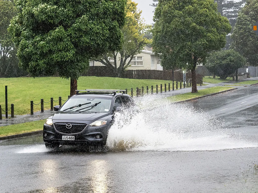 When overland flow paths are obstructed, water can back up into buildings and onto roads